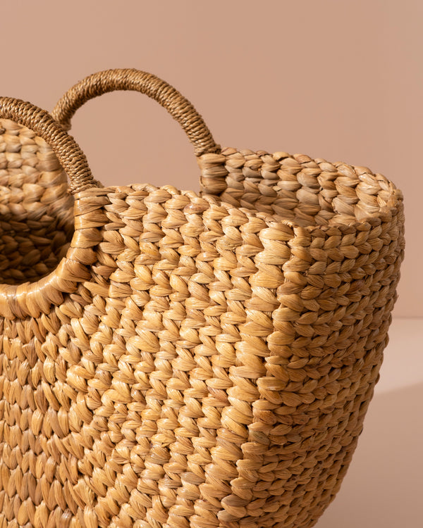 Water hyacinth semi-circular tote with woven straw and braided handles