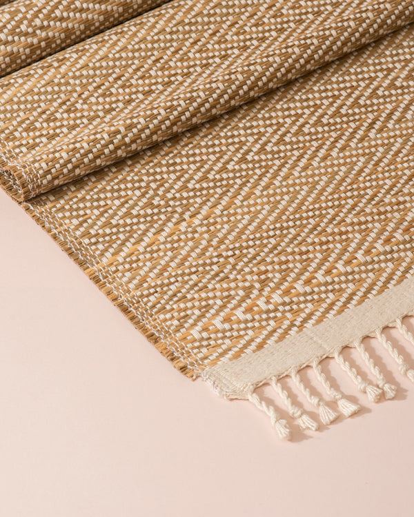 Madurkathi beige herringbone table runner with fringed edges