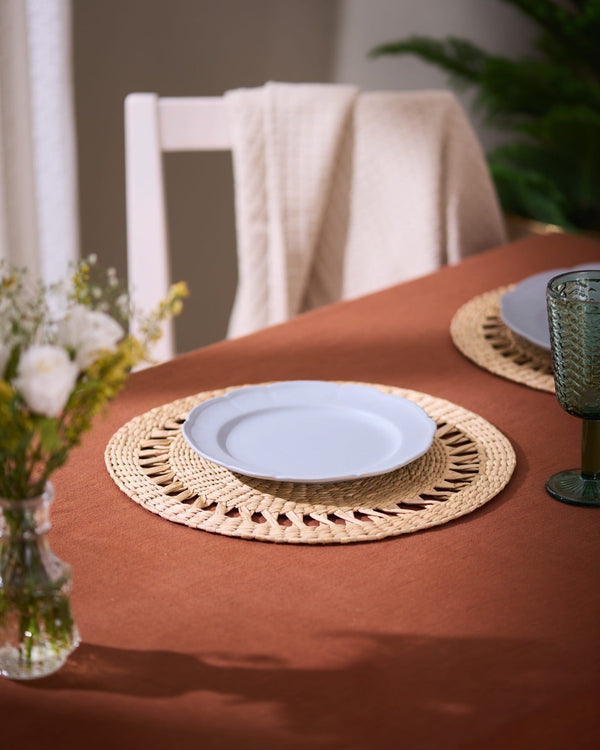 Light blue ceramic plate on Kauna Grass Round Placemat