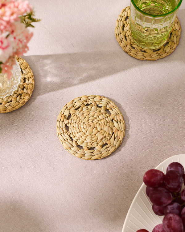 Natural beige Kouna Grass coaster with textured circular pattern, set of 6