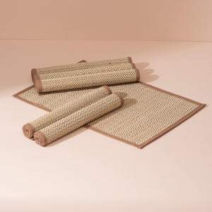 Set of 6 light brown Madurkathi herringbone placemats, beige and tan woven with rolled-up style