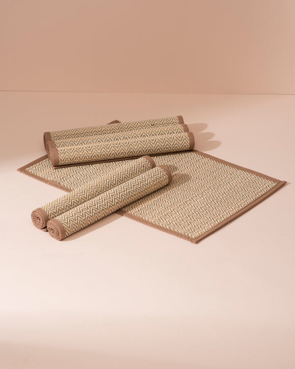 Set of 6 light brown Madurkathi herringbone placemats, beige and tan woven with rolled-up style