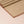 Light brown Madurkathi table runner with beige herringbone pattern and solid brown border, 152cm