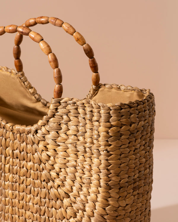 Water hyacinth rectangular woven straw tote bag with wooden bead handles