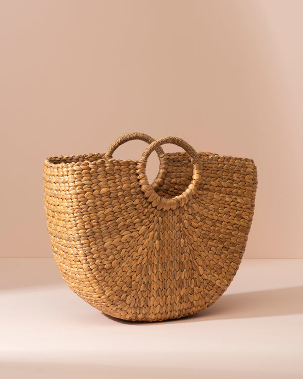 Water hyacinth semi-circular handbag with rounded straw handles