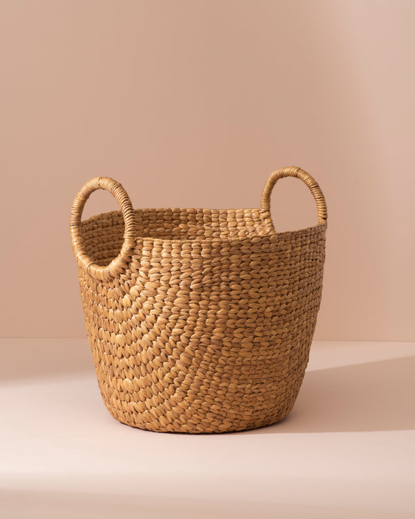 Medium water hyacinth storage basket with seagrass weave and rounded handles