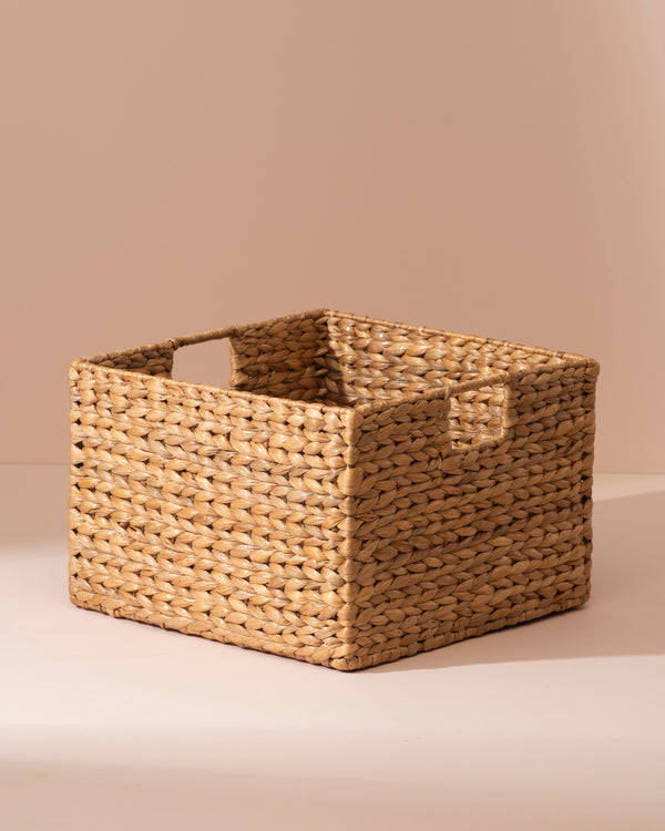 Medium water hyacinth storage basket with woven seagrass and handles