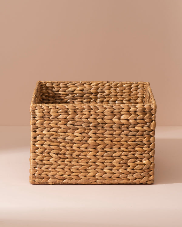 Medium water hyacinth storage basket in light brown seagrass weave