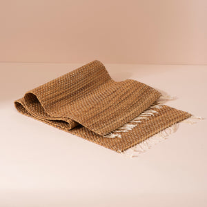Beige woven jute throw blanket with white fringe, water hyacinth style 122cm