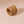 Handwoven beige water hyacinth napkin ring with textured interlaced pattern
